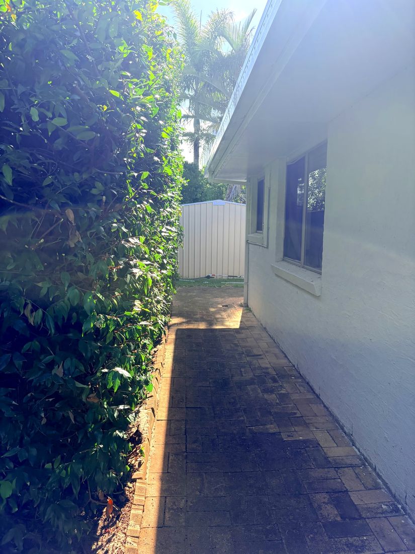Freshly cleared side path at a residential property in Bokarina